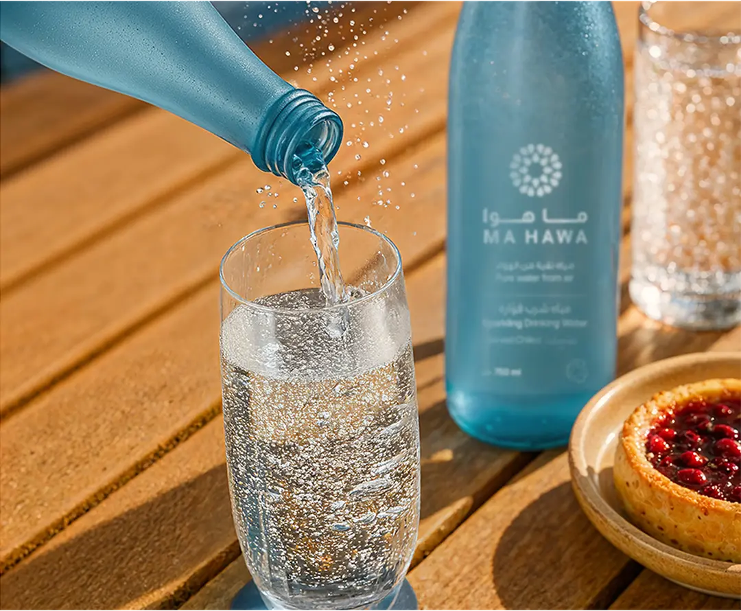 Pouring Ma Hawa water into a glass