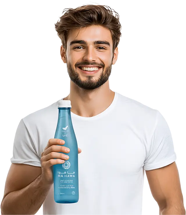 A man holding a Ma Hawa air-to-water bottle
